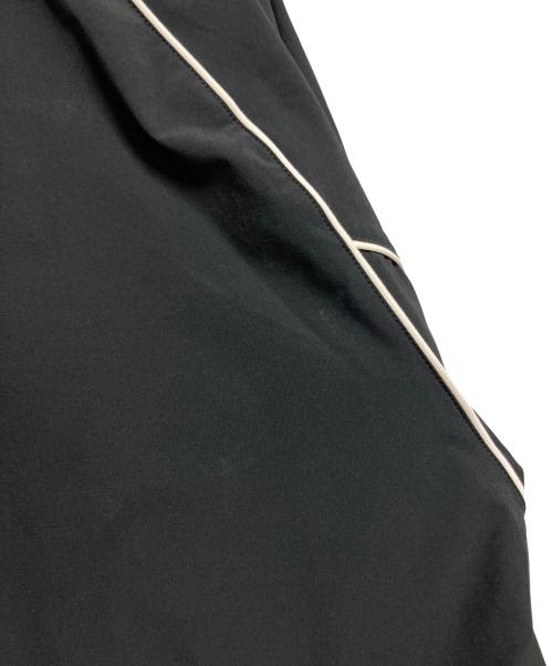 NEW BALANCE（ニューバランス）NEW BALANCE (ニューバランス) ウーブントラックジャケット ブラック×ホワイト サイズ:Lの古着・服飾アイテム