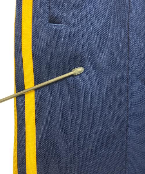 adidas（アディダス）adidas (アディダス) アディカラー クラシックス オーバーサイズ SST トラックパンツ ネイビー×イエロー サイズ:KR S / J Mの古着・服飾アイテム