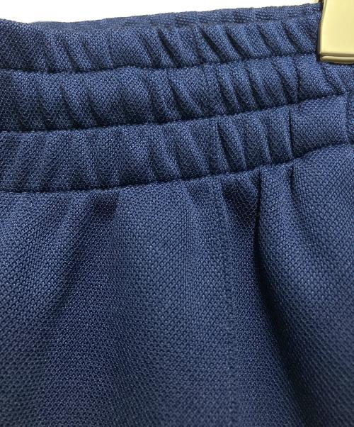 adidas（アディダス）adidas (アディダス) アディカラー クラシックス オーバーサイズ SST トラックパンツ ネイビー×イエロー サイズ:KR S / J Mの古着・服飾アイテム