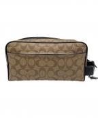 COACHコーチ）の古着「ラージトラベルキット」｜ブラウン