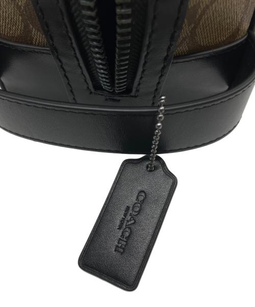 COACH（コーチ）COACH (コーチ) ラージトラベルキット ブラウンの古着・服飾アイテム