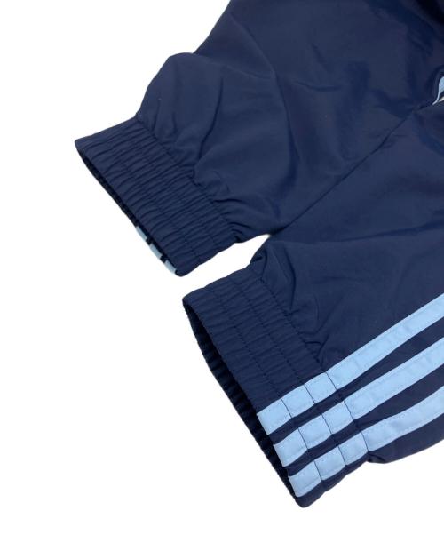 adidas（アディダス）adidas (アディダス) アディカラー ウーブン ファイヤーバード トラックトップ ネイビー サイズ:ASIA A/M / KR M / J Lの古着・服飾アイテム