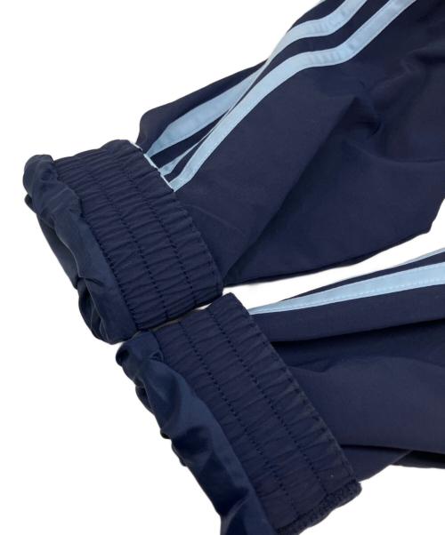 adidas（アディダス）adidas (アディダス) アディカラー ウーブン ファイヤーバード トラックトップ ネイビー サイズ:ASIA A/M / KR M / J Lの古着・服飾アイテム