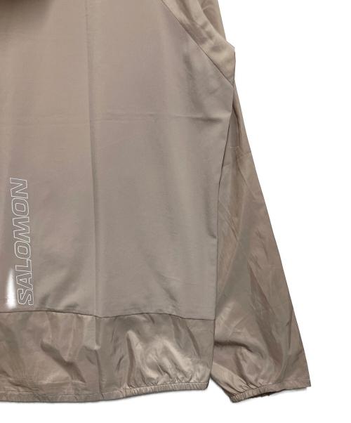 SALOMON（サロモン）SALOMON (サロモン) ウインドブレーカー ベージュ サイズ:SIZE XLの古着・服飾アイテム