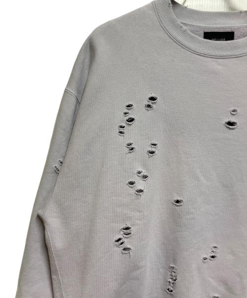 DELUXE（デラックス）DELUXE (デラックス) ダメージ加工スウェット パープル サイズ:SIZE Mの古着・服飾アイテム