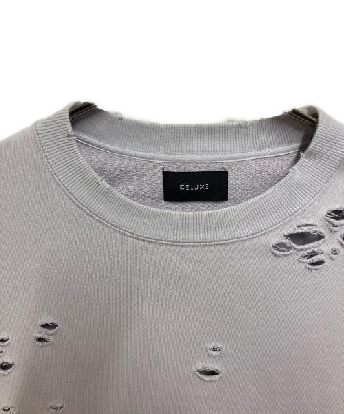 DELUXE（デラックス）DELUXE (デラックス) ダメージ加工スウェット パープル サイズ:SIZE Mの古着・服飾アイテム
