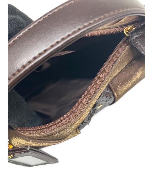 MCM（エムシーエム）MCM (エムシーエム) ハンドバッグ ブラウンの古着・服飾アイテム