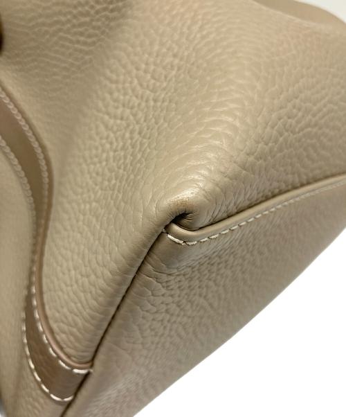 VASIC（ヴァジック）VASIC (ヴァジック) 巾着バッグ ベージュの古着・服飾アイテム