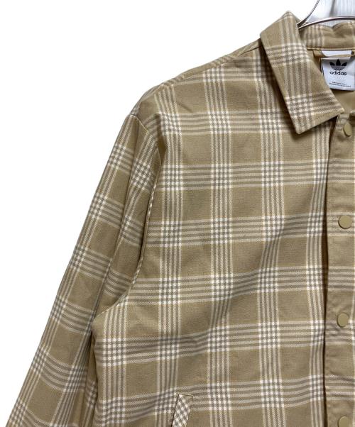 adidas（アディダス）adidas (アディダス) コーチジャケット ベージュ サイズ:Ｌの古着・服飾アイテム