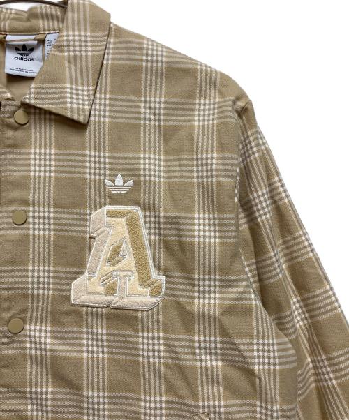 adidas（アディダス）adidas (アディダス) コーチジャケット ベージュ サイズ:Ｌの古着・服飾アイテム