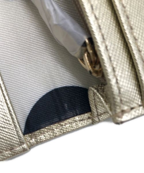 Kate Spade（ケイトスペード）Kate Spade (ケイトスペード) 小銭入れ ゴールドの古着・服飾アイテム