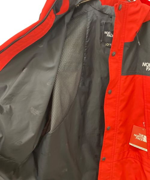 THE NORTH FACE（ザ ノース フェイス）THE NORTH FACE (ザ ノース フェイス) マウンテンライトジャケット レッド×ブラック サイズ:L 未使用品の古着・服飾アイテム