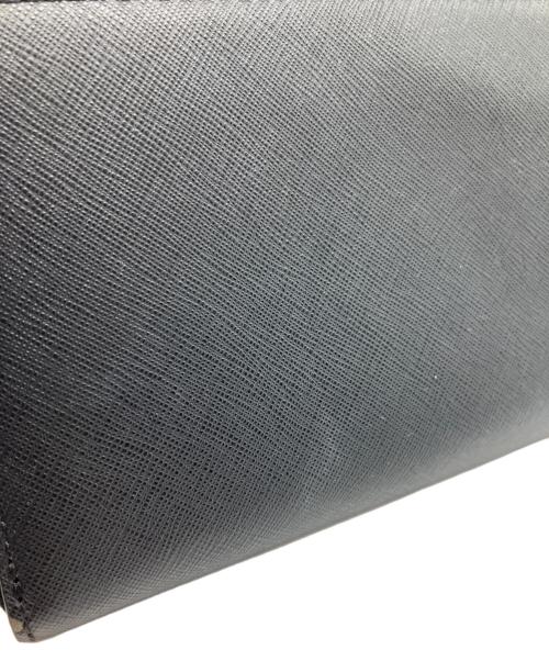 TORY BURCH（トリーバーチ）TORY BURCH (トリーバーチ) ラウンドファスナー財布 ブラック×ネイビーの古着・服飾アイテム