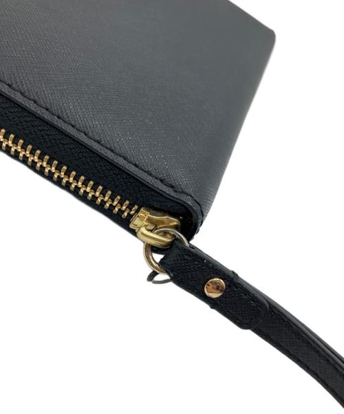 TORY BURCH（トリーバーチ）TORY BURCH (トリーバーチ) ラウンドファスナー財布 ブラック×ネイビーの古着・服飾アイテム