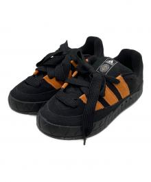 adidas×JAMAL SMITH（アディダス×ジャマール スミス）の古着「ローカットスニーカー」｜ブラック×オレンジ