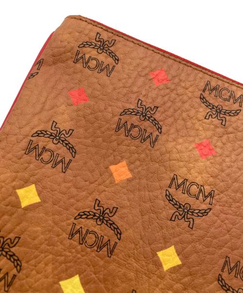 MCM（エムシーエム）MCM (エムシーエム) クラッチバッグ ブラウンの古着・服飾アイテム