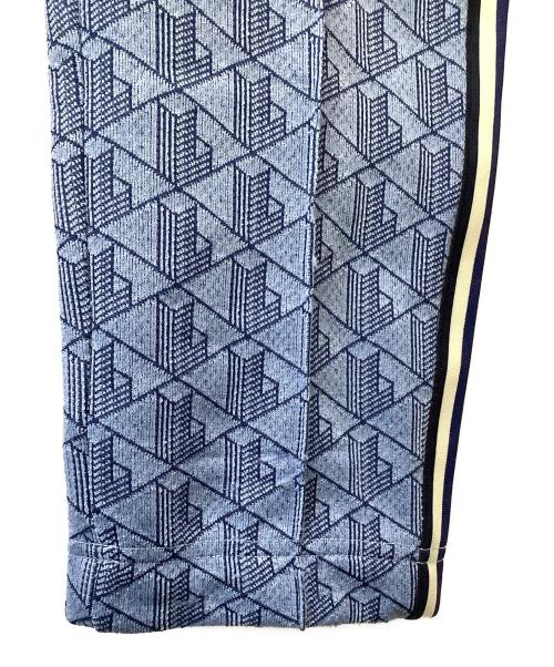 LACOSTE（ラコステ）LACOSTE (ラコステ) サイドテーピングモノグラムジャカードトラックパンツ スカイブルー サイズ:US XSの古着・服飾アイテム