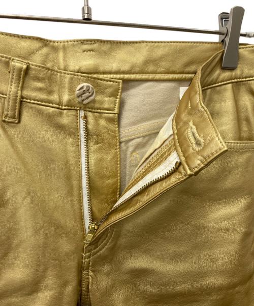 COMME des GARCONS HOMME PLUS（コムデギャルソンオムプリュス）COMME des GARCONS HOMME PLUS (コムデギャルソンオムプリュス) フェイクレザーパンツ ゴールド サイズ:XSの古着・服飾アイテム