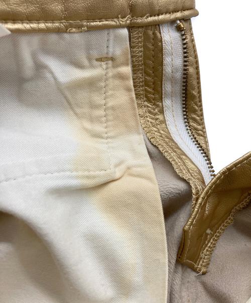 COMME des GARCONS HOMME PLUS（コムデギャルソンオムプリュス）COMME des GARCONS HOMME PLUS (コムデギャルソンオムプリュス) フェイクレザーパンツ ゴールド サイズ:XSの古着・服飾アイテム