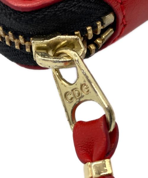 COMME des GARCONS（コムデギャルソン）COMME des GARCONS (コムデギャルソン) 2つ折り財布 レッドの古着・服飾アイテム