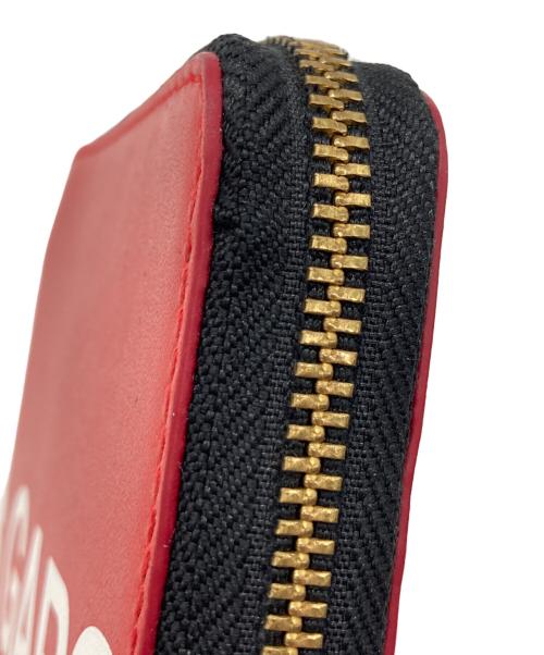 COMME des GARCONS（コムデギャルソン）COMME des GARCONS (コムデギャルソン) 2つ折り財布 レッドの古着・服飾アイテム