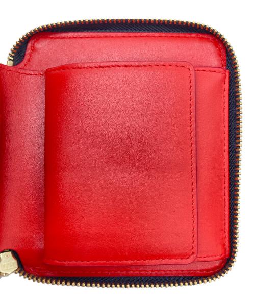 COMME des GARCONS（コムデギャルソン）COMME des GARCONS (コムデギャルソン) 2つ折り財布 レッドの古着・服飾アイテム