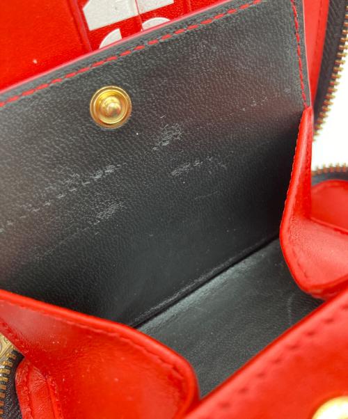 COMME des GARCONS（コムデギャルソン）COMME des GARCONS (コムデギャルソン) 2つ折り財布 レッドの古着・服飾アイテム