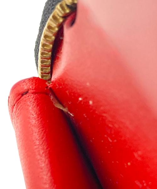 COMME des GARCONS（コムデギャルソン）COMME des GARCONS (コムデギャルソン) 2つ折り財布 レッドの古着・服飾アイテム