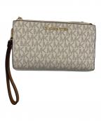 MICHAEL KORSマイケル・コース）の古着「2つ折り財布」｜ホワイト