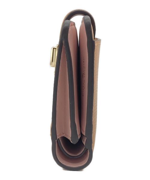 Kate Spade（ケイトスペード）Kate Spade (ケイトスペード) フィービー ターンロック ミディアム ウォレット ベージュの古着・服飾アイテム