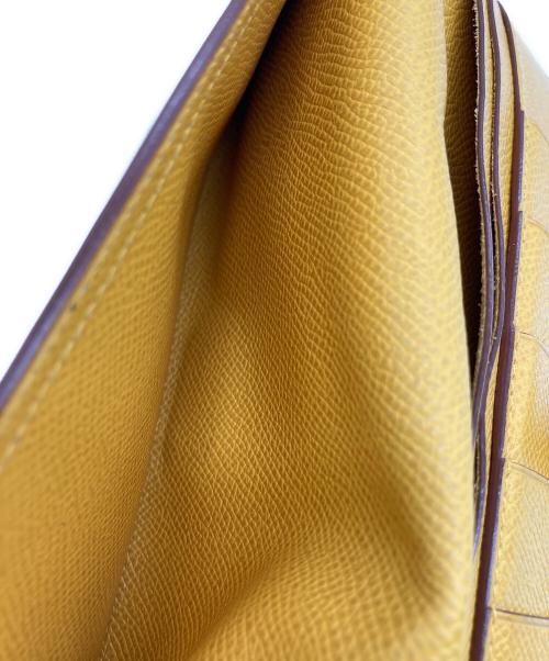 HERMES（エルメス）HERMES (エルメス) 長財布 イエローの古着・服飾アイテム