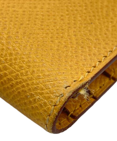 HERMES（エルメス）HERMES (エルメス) 長財布 イエローの古着・服飾アイテム