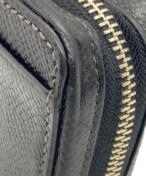 TAKEO KIKUCHI（タケオキクチ）TAKEO KIKUCHI (タケオキクチ) ラウンドファスナー財布 ブラックの古着・服飾アイテム