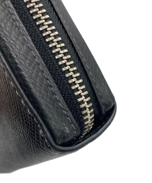 TAKEO KIKUCHI（タケオキクチ）TAKEO KIKUCHI (タケオキクチ) ラウンドファスナー財布 ブラックの古着・服飾アイテム