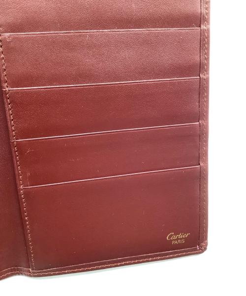 Cartier（カルティエ）Cartier (カルティエ) 札入れ ボルドーの古着・服飾アイテム