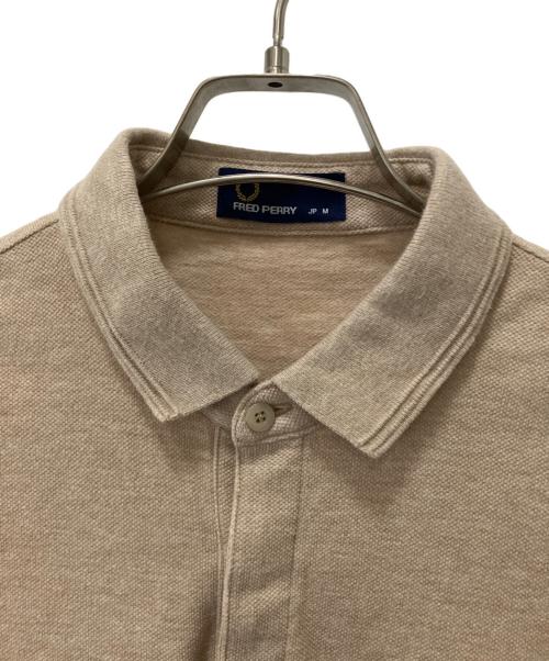 FRED PERRY（フレッドペリー）FRED PERRY (フレッドペリー) ポロシャツ ブラウン×オレンジ サイズ:Mの古着・服飾アイテム
