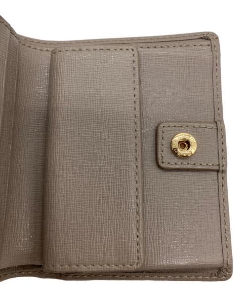 FURLA（フルラ）FURLA (フルラ) 2つ折り財布 ベージュの古着・服飾アイテム