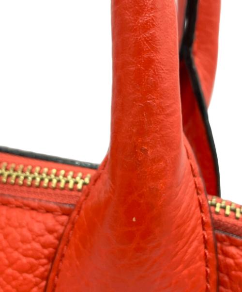 Kate Spade（ケイトスペード）Kate Spade (ケイトスペード) サウスポートアベニュースモールジニー オレンジの古着・服飾アイテム