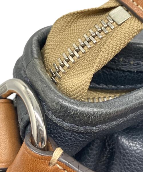 COACH（コーチ）COACH (コーチ) 2WAYバッグ　HARRISON East West Satchel ネイビー×ブラウンの古着・服飾アイテム