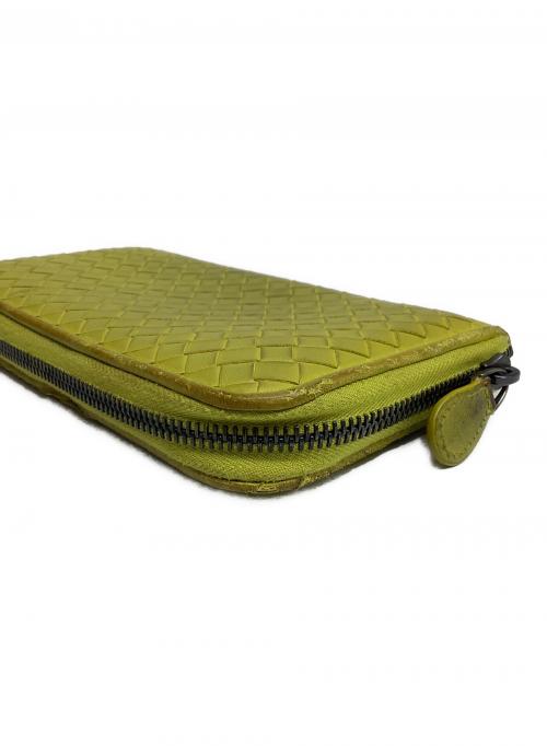 BOTTEGA VENETA（ボッテガベネタ）BOTTEGA VENETA (ボッテガベネタ) ラウンドファスナー長財布 イエローの古着・服飾アイテム