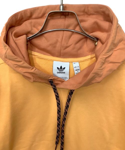 adidas Originals（アディダスオリジナル）adidas originals (アディダスオリジナル) プルオーバーパーカー オレンジ サイズ:O 未使用品の古着・服飾アイテム