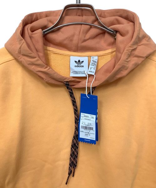 adidas Originals（アディダスオリジナル）adidas originals (アディダスオリジナル) プルオーバーパーカー オレンジ サイズ:O 未使用品の古着・服飾アイテム