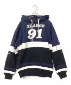 X-LARGEエクストララージ）の古着「TEAM PANELED HOODED SWEAT」｜ネイビー
