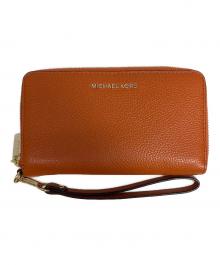 MICHAEL KORS（マイケルコース）の古着「長財布」｜オレンジ