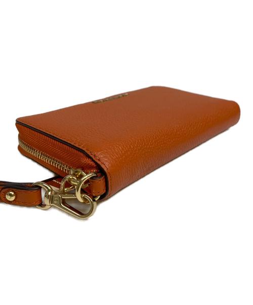 MICHAEL KORS（マイケルコース）MICHAEL KORS (マイケルコース) 長財布 オレンジの古着・服飾アイテム