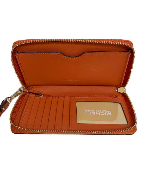 MICHAEL KORS（マイケルコース）MICHAEL KORS (マイケルコース) 長財布 オレンジの古着・服飾アイテム