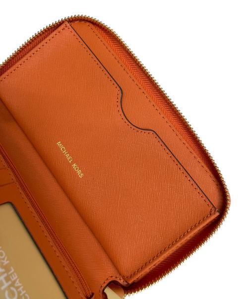 MICHAEL KORS（マイケルコース）MICHAEL KORS (マイケルコース) 長財布 オレンジの古着・服飾アイテム