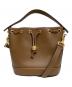 TORY BURCH（トリーバーチ）の古着「Tモノグラムレザーバケットバッグ」｜ブラウン