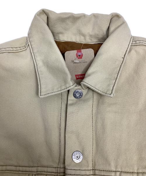 LEVI'S（リーバイス）LEVI'S (リーバイス) トラッカージャケット ベージュ サイズ:Mの古着・服飾アイテム