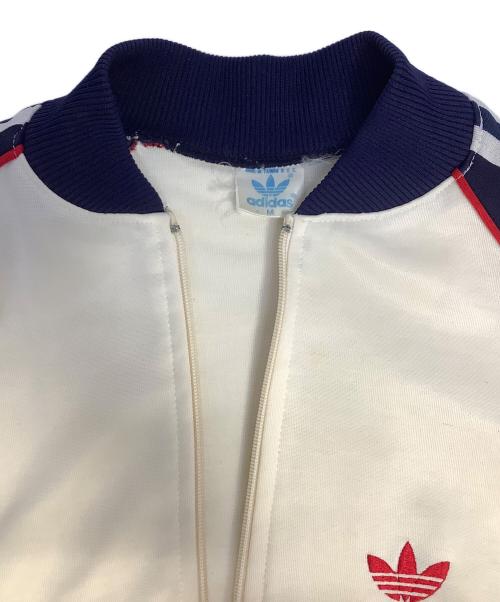 adidas（アディダス）adidas (アディダス) トラックジャケット ベージュ サイズ:Mの古着・服飾アイテム